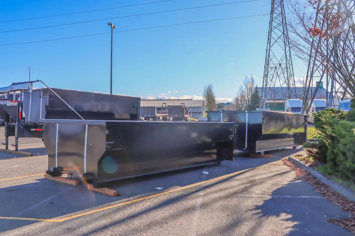 Roll-off dumpster ready for waste disposal at job site for 20 Yard Dumpster Rental in Windham